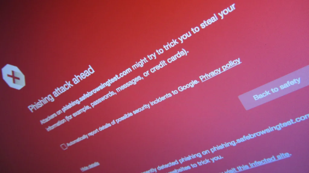 Red browser warning page reading Phishing attack ahead